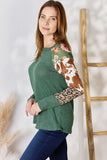Hailey & Co Full Size Waffle-Knit Leopard Blouse